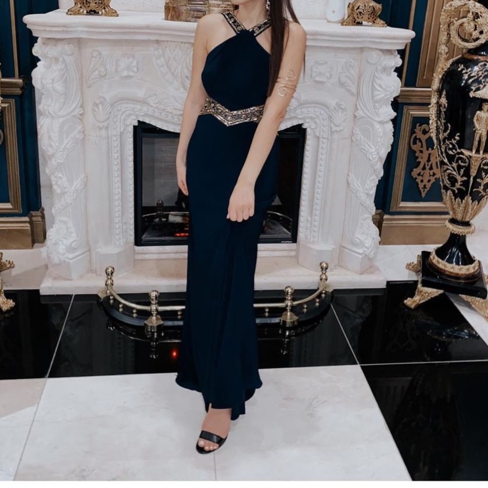 Elegant evening gown in navy with gold detailing